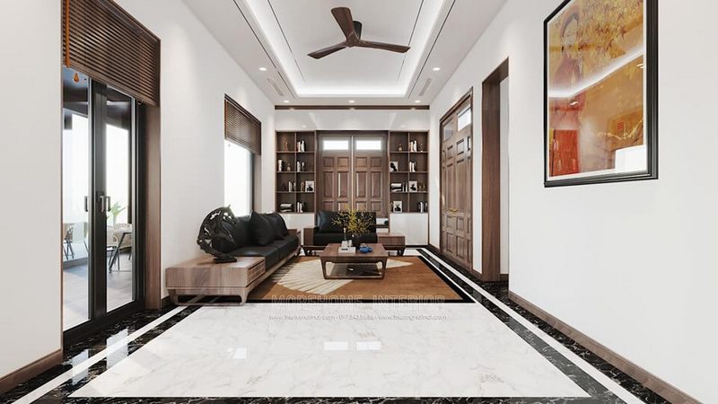 Tranh trí hơi hướng Châu Âu với quạt trần và tranh kính phòng khách cổ điển