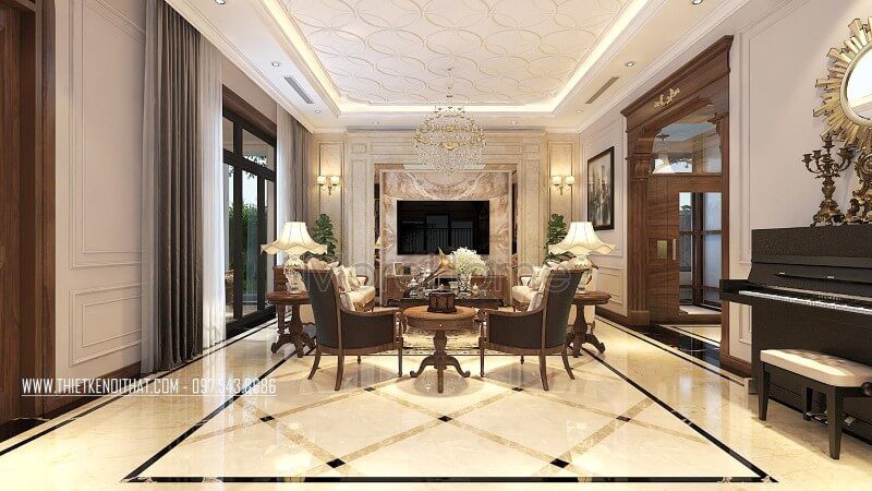 Để tạo ra một không gian phòng khách biệt thự đẹp, sắp xếp bàn ghế sofa đơn bằng gỗ óc chó cao cấp là một gợi ý thiết kế tuyệt vời.